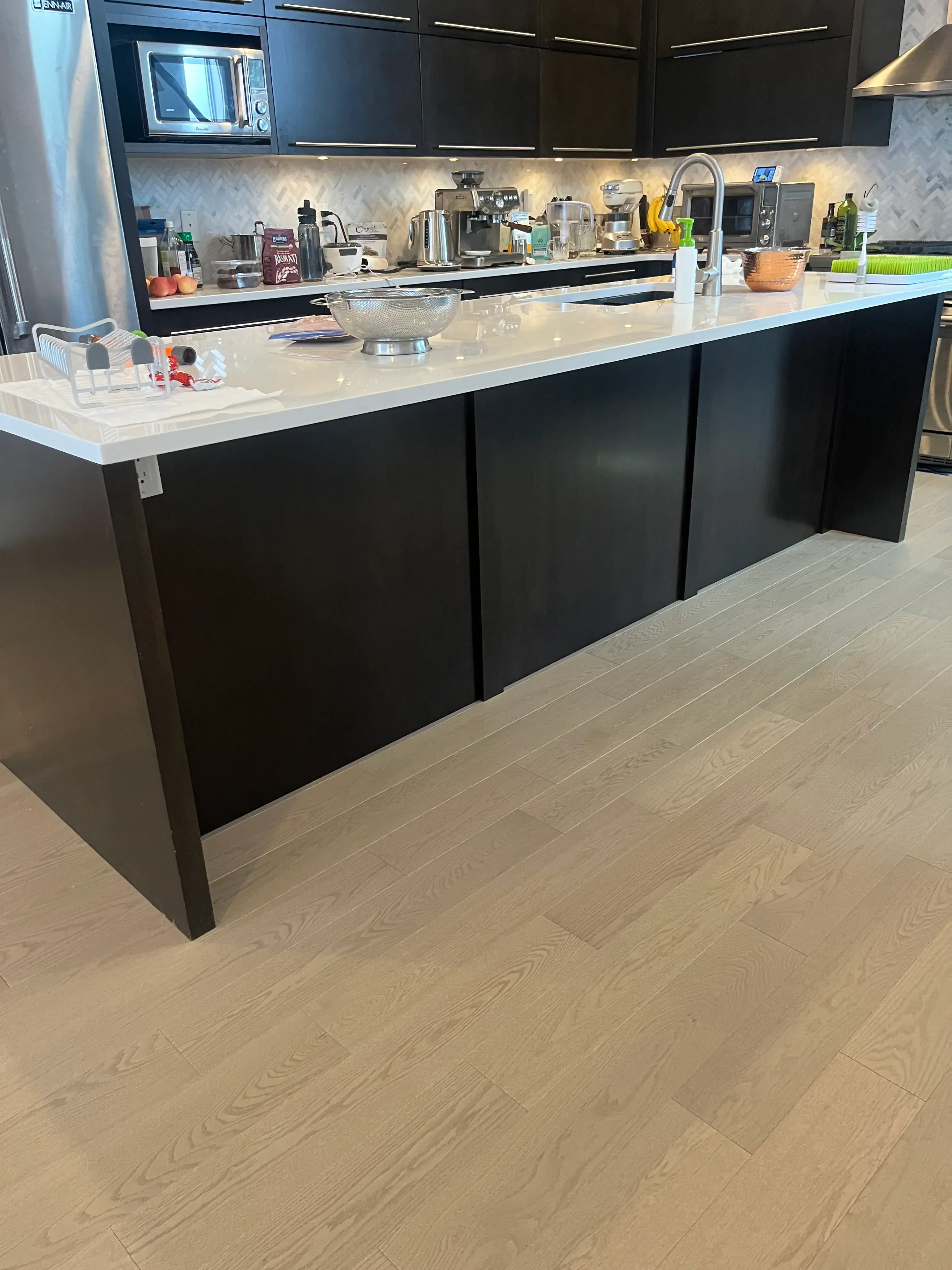 Black Slab Kitchen Island - Calgary trade millwork project by Rocky Mountain Millwork