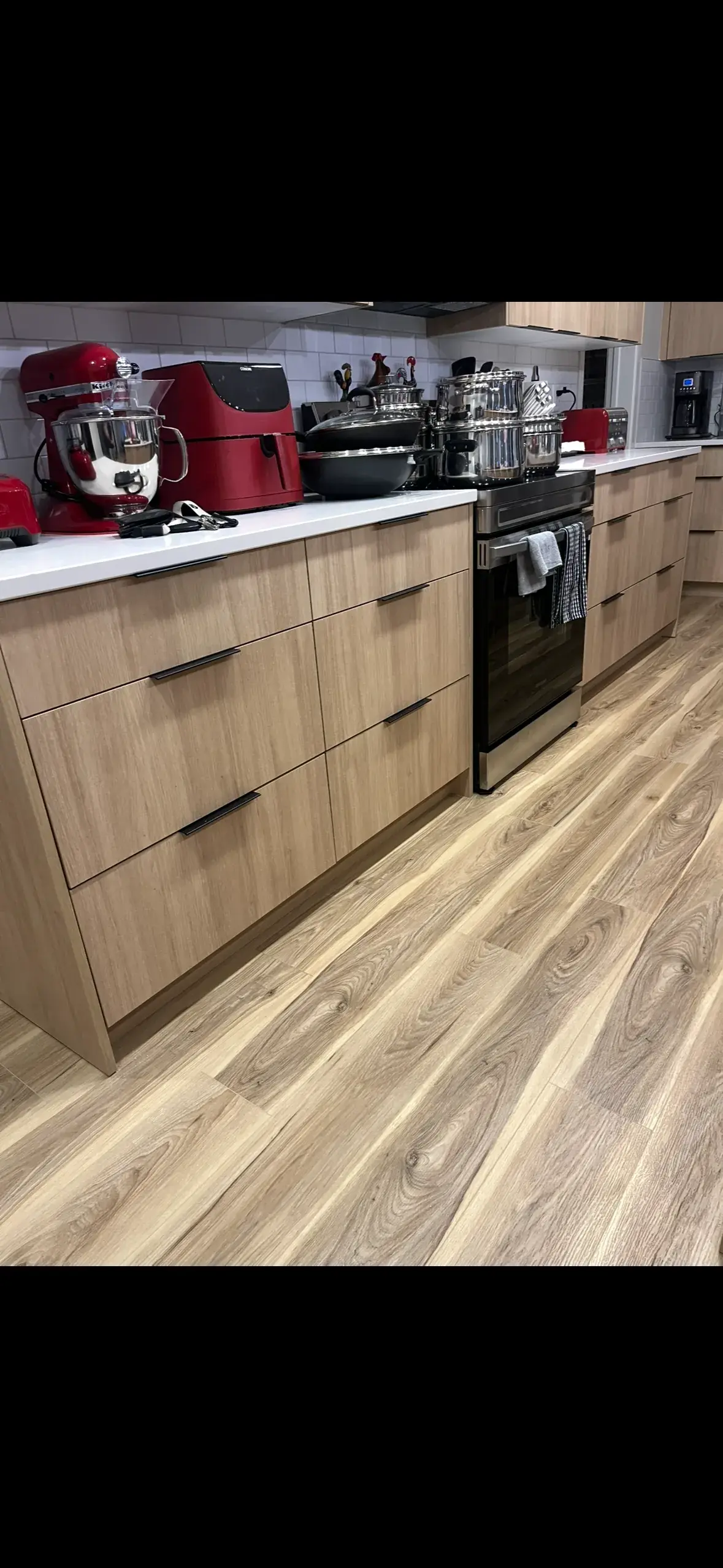 Modern Oak Slab Kitchen - Calgary trade millwork project by Rocky Mountain Millwork