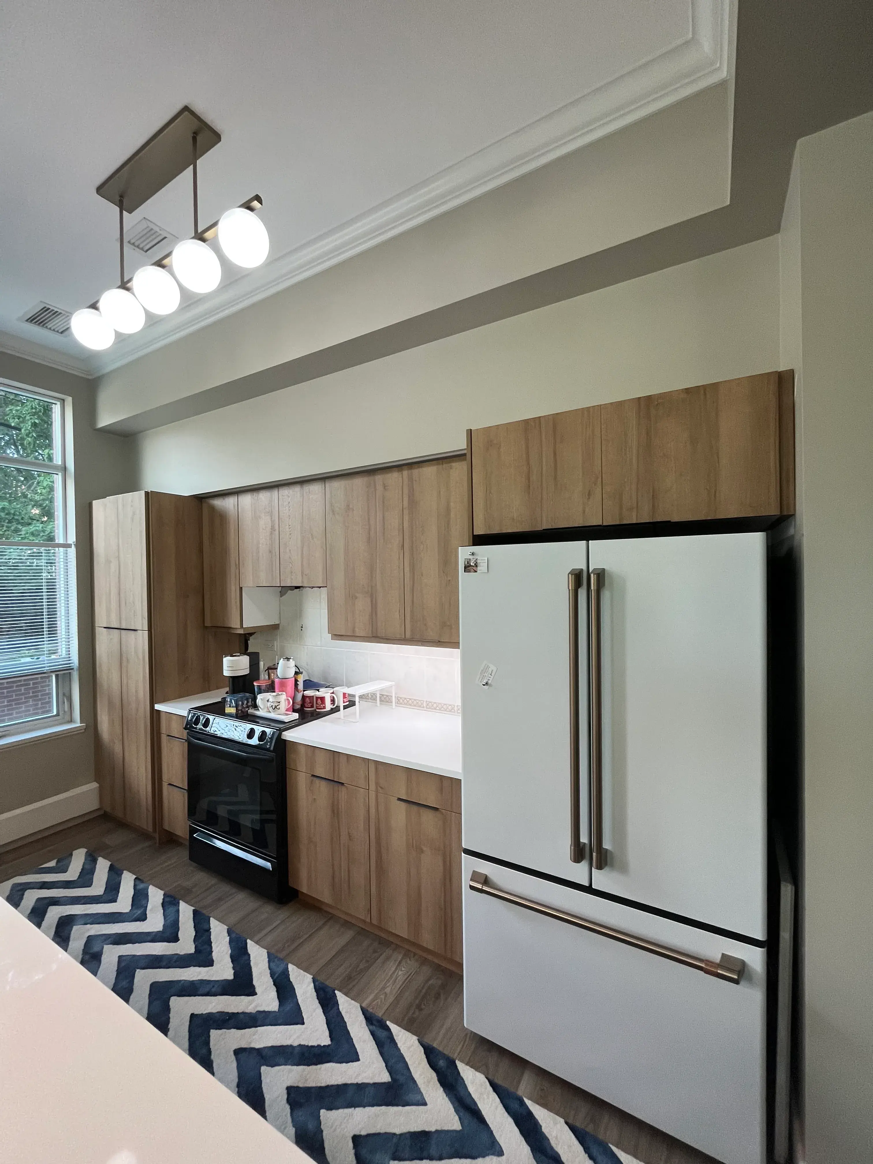 Two-Tone Wood & White Kitchen - Calgary trade millwork project by Rocky Mountain Millwork