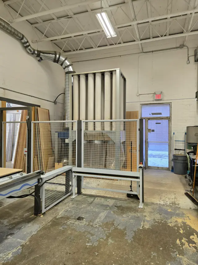 Professional edge banding and panel saw equipment at Calgary millwork facility